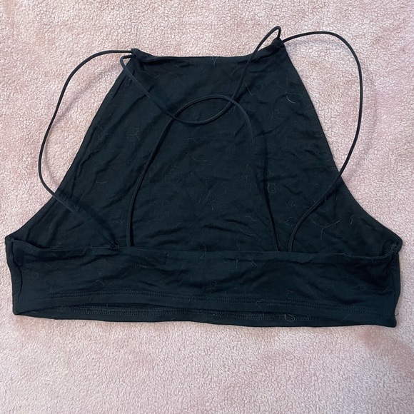 Super cute black halter tank with strappy back. Perfect for going out. - Picture 2 of 4